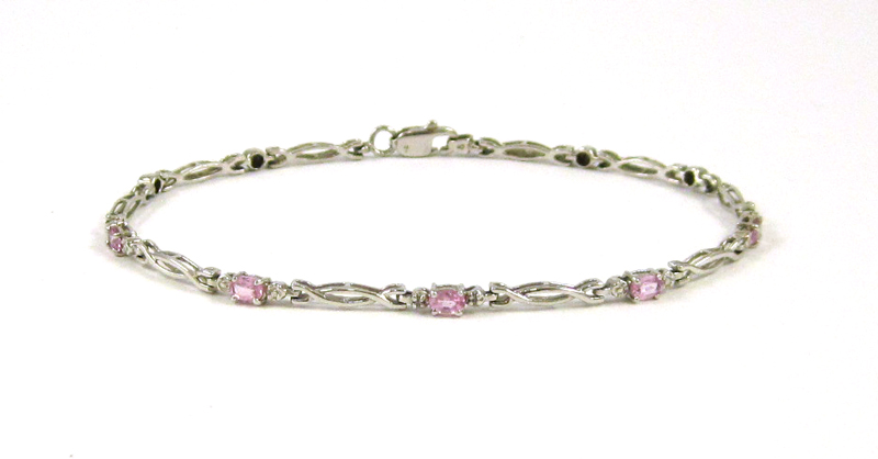 Appraisal: PINK TOPAZ AND DIAMOND BRACELET The k white gold bracelet