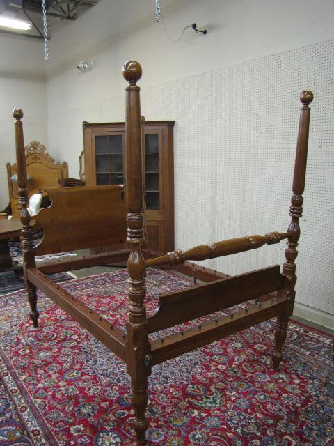 Appraisal: Early American cherry poster bed full size rope bed has