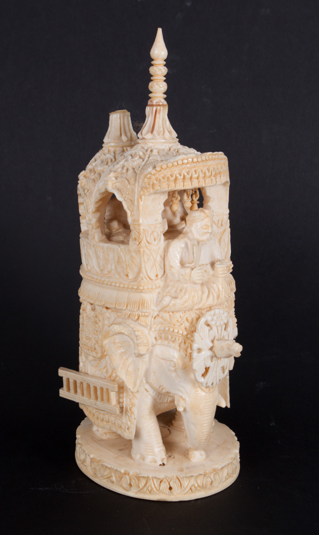 Appraisal: Indian carved ivory figural group modeled as figures riding elephant