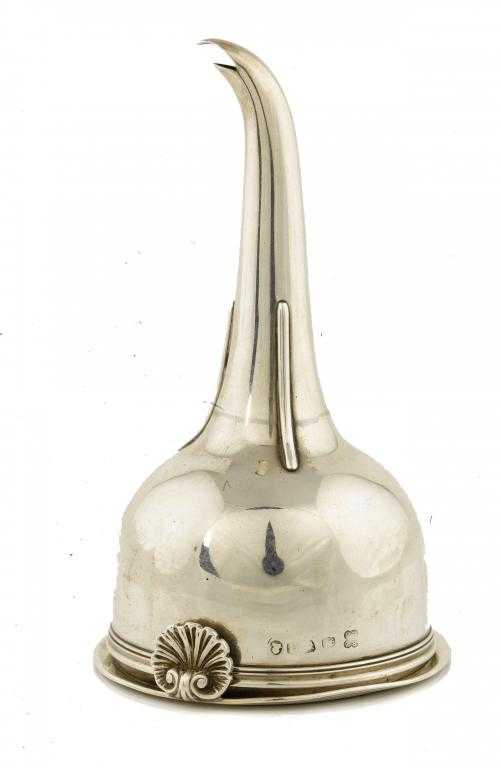 Appraisal: A GEORGE IV WINE FUNNEL with reeded rims and shell