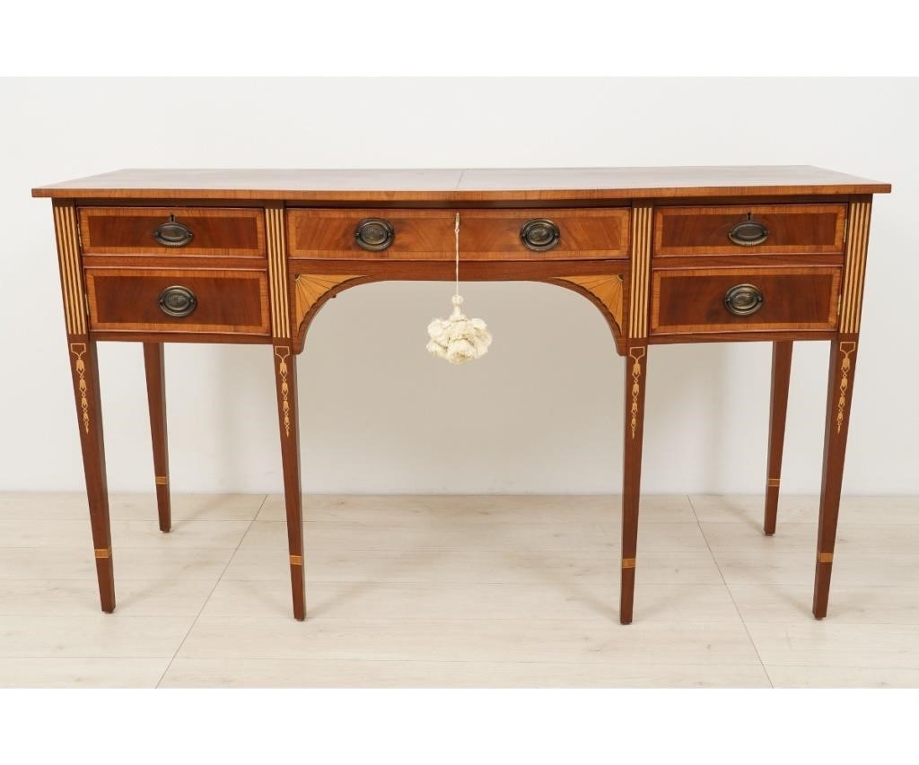 Appraisal: Hepplewhite style mahogany inlaid sideboard with shaped top bellflower inlaid