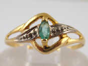 Appraisal: A yellow metal tests carat gold emerald ring size O