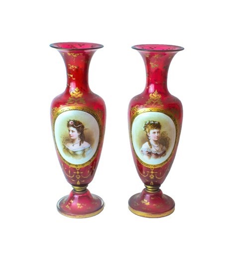 Appraisal: A pair of Victorian cranberry glass and enamel vases each