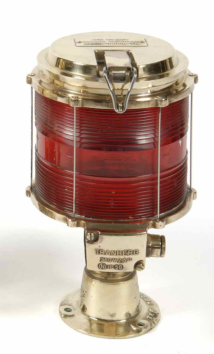 Appraisal: BRASS PIER LANTERN With red Fresnel lens Brass pedestal Height