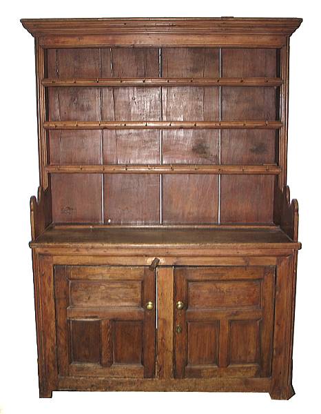 Appraisal: A mixed wood high dresser height ft in width ft