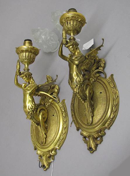 Appraisal: A pair of Empire style gilt bronze figural bras de