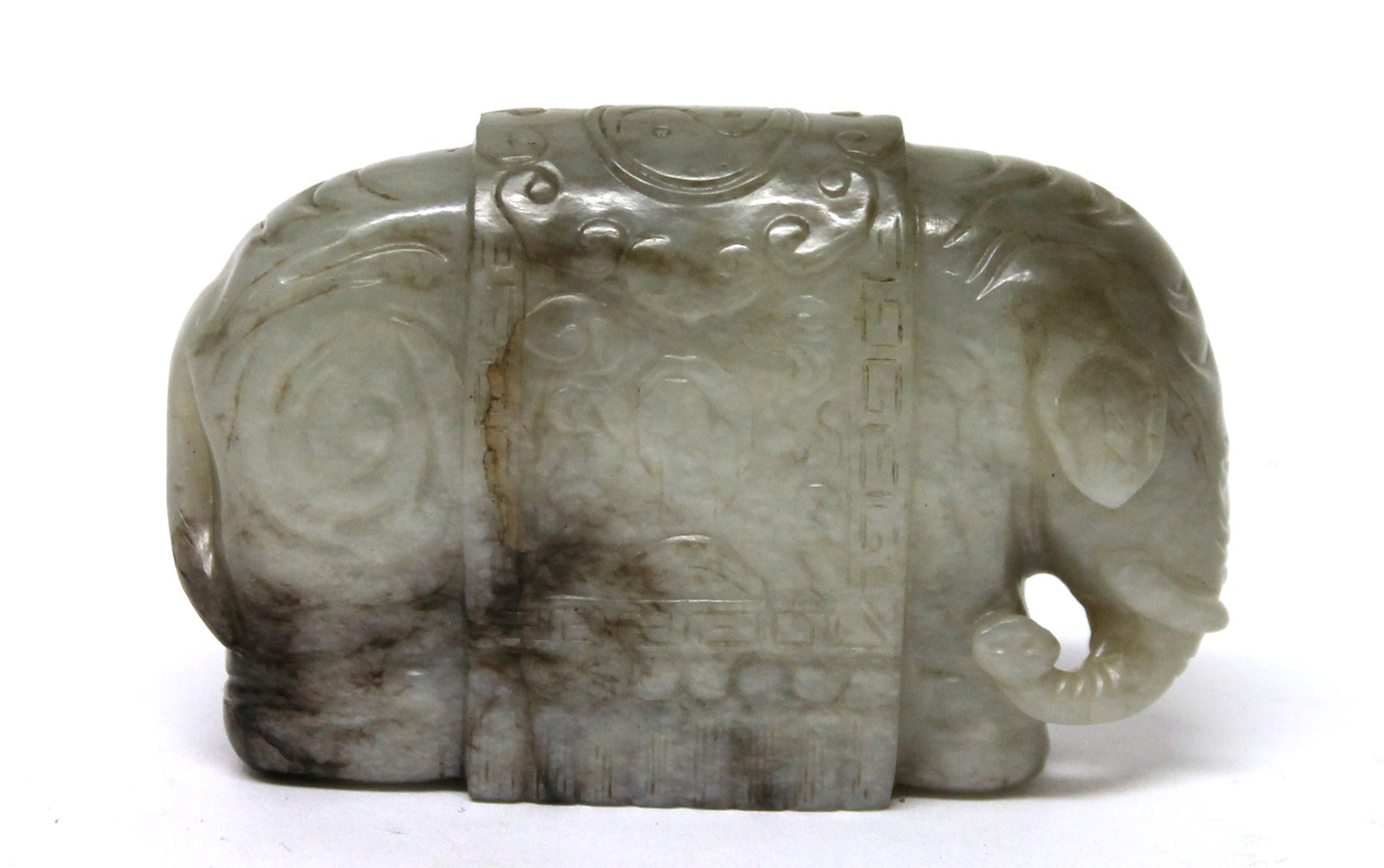 Appraisal: A pale mottled grey jade figure of an elephant th