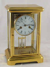 Appraisal: A four glass gilded brass eight day mantel clock with