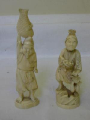 Appraisal: AN IVORY OKIMONO of old man with vegetables early th