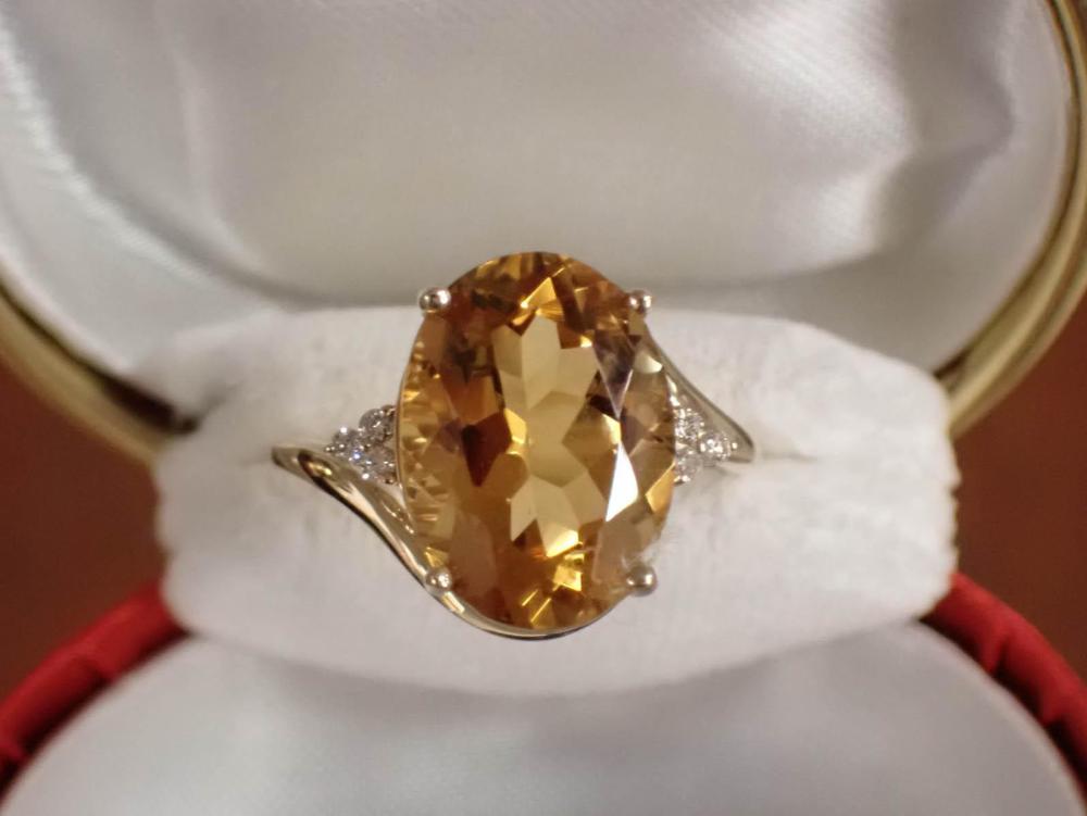 Appraisal: CITRINE DIAMOND AND FOURTEEN KARAT GOLD RING The k yellow