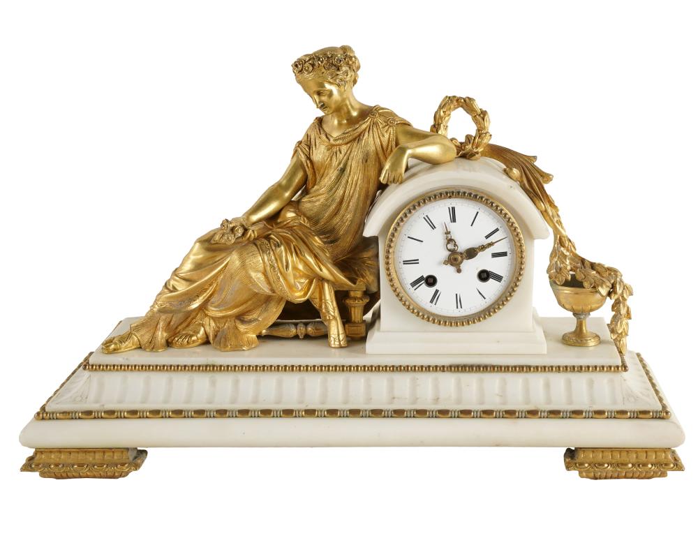 Appraisal: NEOCLASSICAL-STYLE GILT BRONZE MARBLE CLOCKappears unsigned with pendulum Condition slight