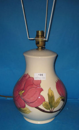 Appraisal: Moorcroft Lampbase decorated in the Magnolia design on cream ground