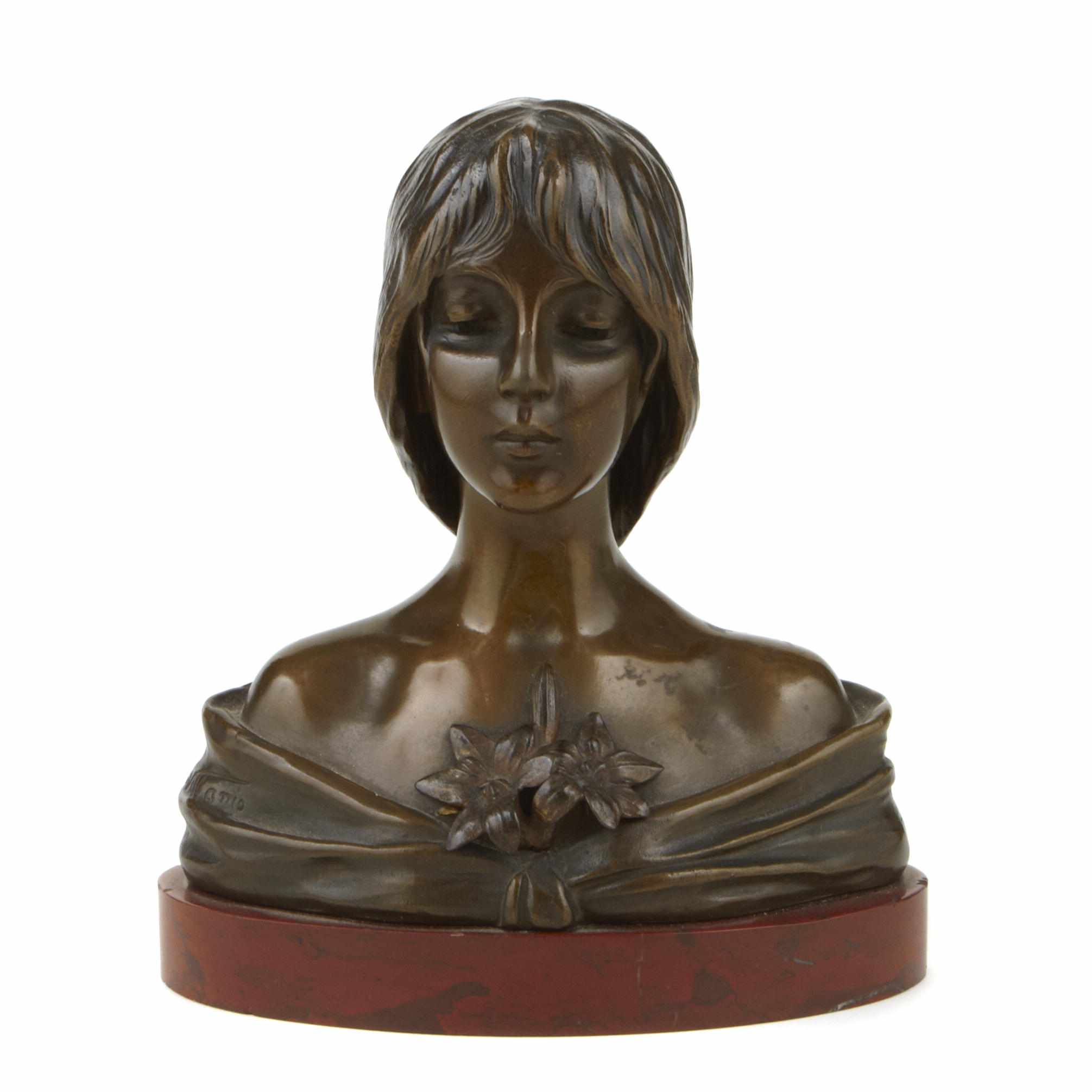 Appraisal: A bronze bust of a maiden Le Lis cast after