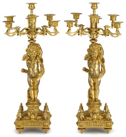 Appraisal: Pair of French gilt bronze seven-light figural candelabra late th