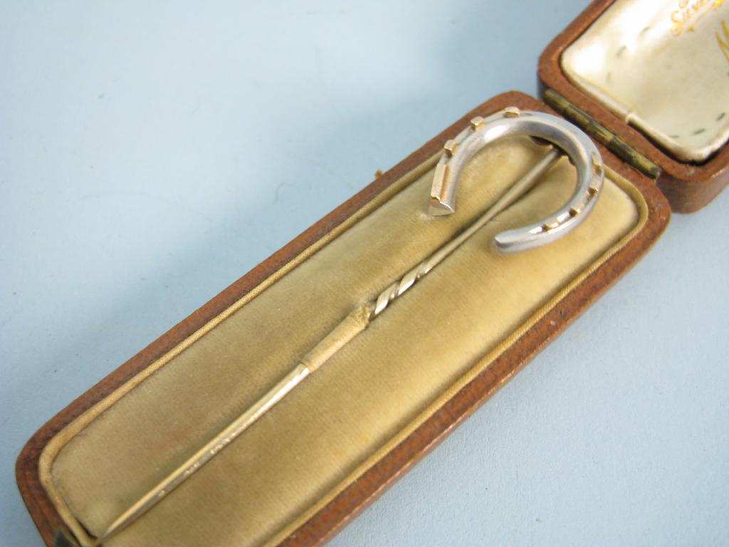 Appraisal: A gent's Stickpin with horseshoe finial in leather case