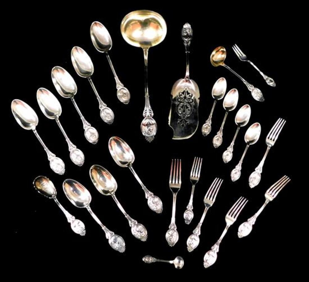 Appraisal: SILVER Twenty-four pieces medallion silver serving and flatware Wood Hughes