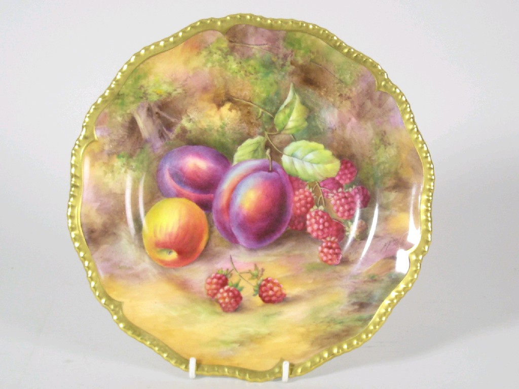 Appraisal: A Royal Worcester Dessert Plate painted fruit by Horace H