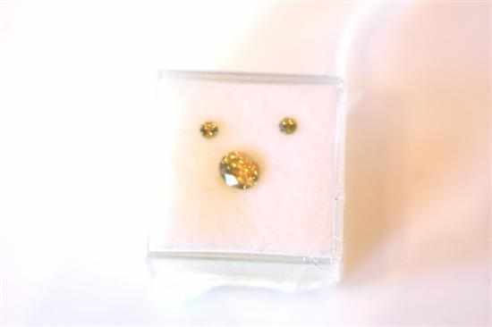 Appraisal: A COLLECTION OF THREE LOOSE GOLDEN SAPPHIRES