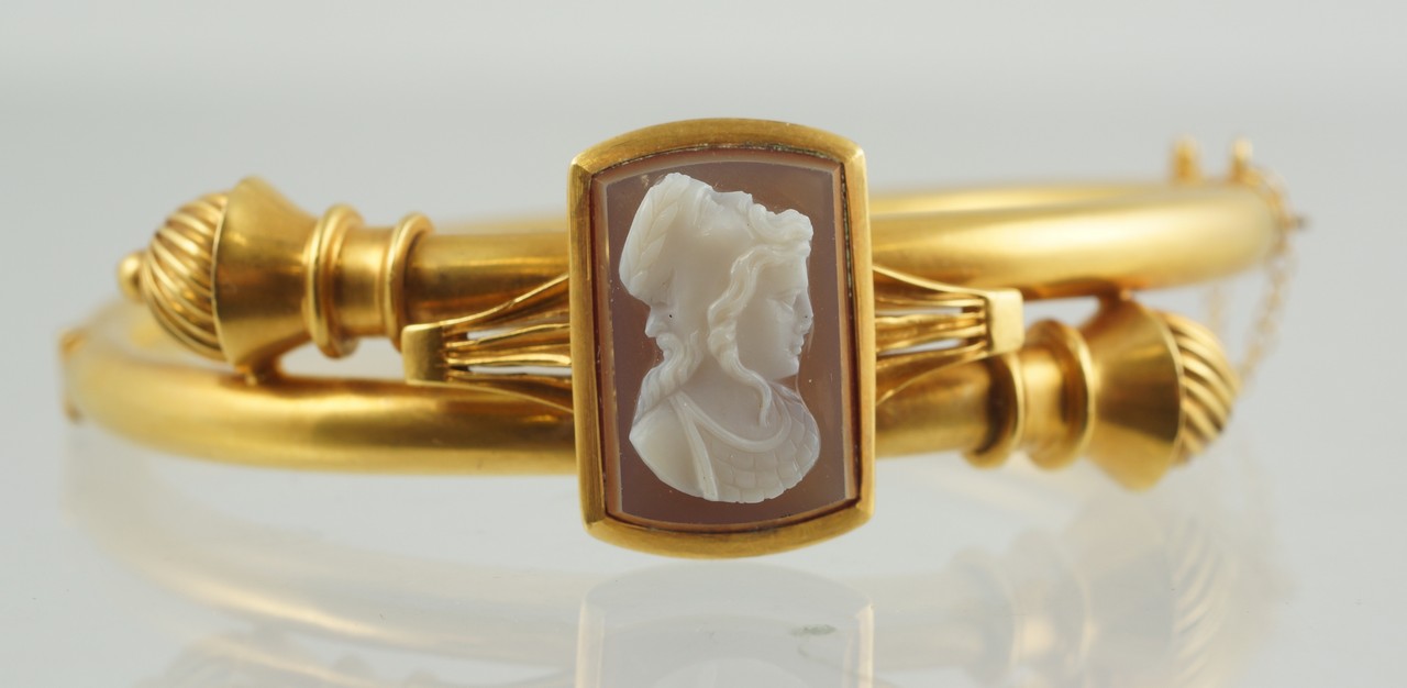 Appraisal: K YG hinged clasp bracelet set with rectangular carved shell