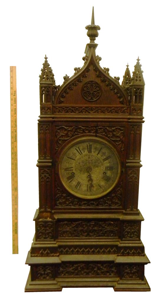 Appraisal: Turn-of-the-century Neo-Gothic monumental shelf clock c - clock assembles from