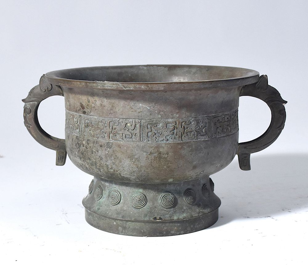 Appraisal: Asian bronze censer with animal motif handles Asian bronze censer