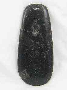 Appraisal: A Chinese jade tool possibly an axe head engraved Chinese