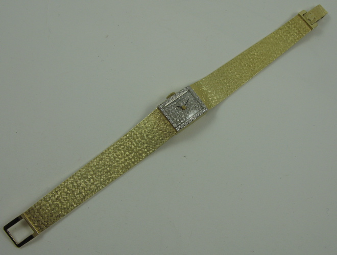 Appraisal: DIAMOND AND FOURTEEN KARAT GOLD BRACELET WRISTWATCH Omega Watch Co