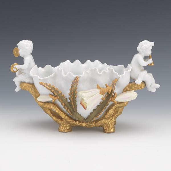 Appraisal: MOORE BROTHERS CHERUB PORCELAIN BOWL x Moore Brothers porcelain dish