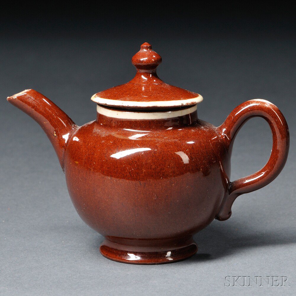 Appraisal: Staffordshire Redware Miniature Teapot and Cover England c globular shape