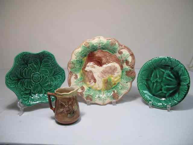 Appraisal: Three Majolica pottery plates two green and one with dog