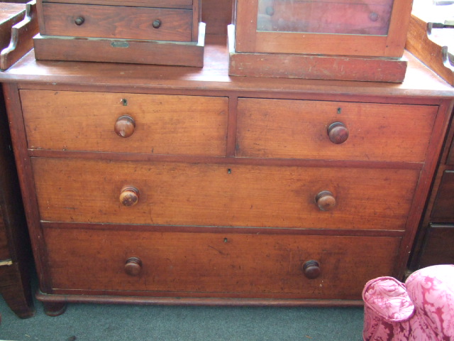 Appraisal: A Victorian mahogany chest of drawers the gallery back above