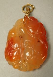 Appraisal: Asian Carved Peach Color Stone Pendant with K G Asian