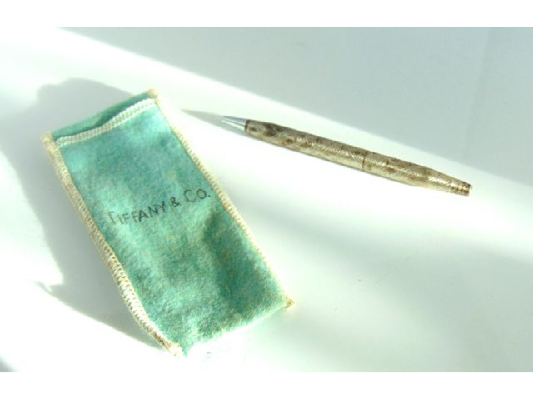 Appraisal: A Sterling silver ballpoint pen Tiffany Co engraved with criss-cross