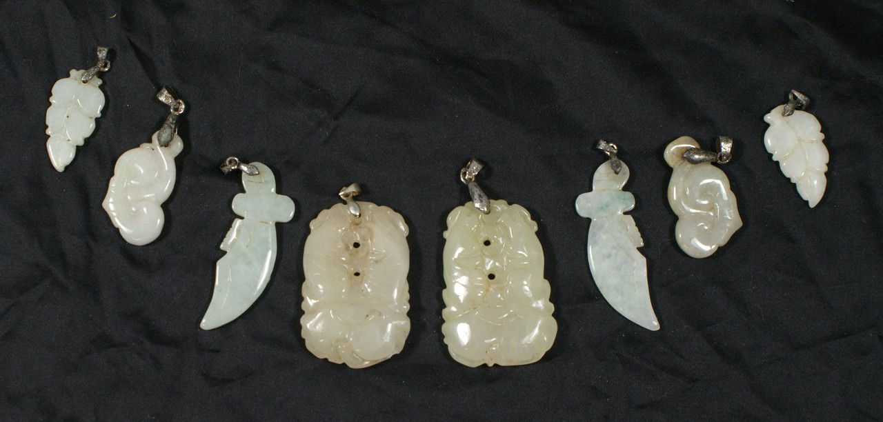 Appraisal: carved jade pendants longest