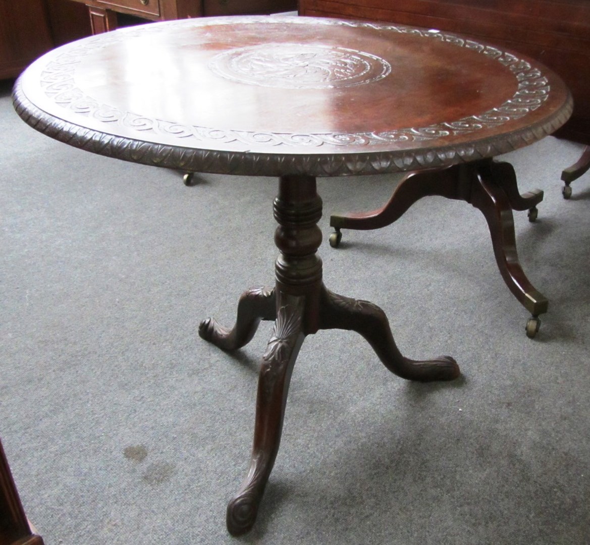 Appraisal: A George III circular mahogany snap top tripod table cm