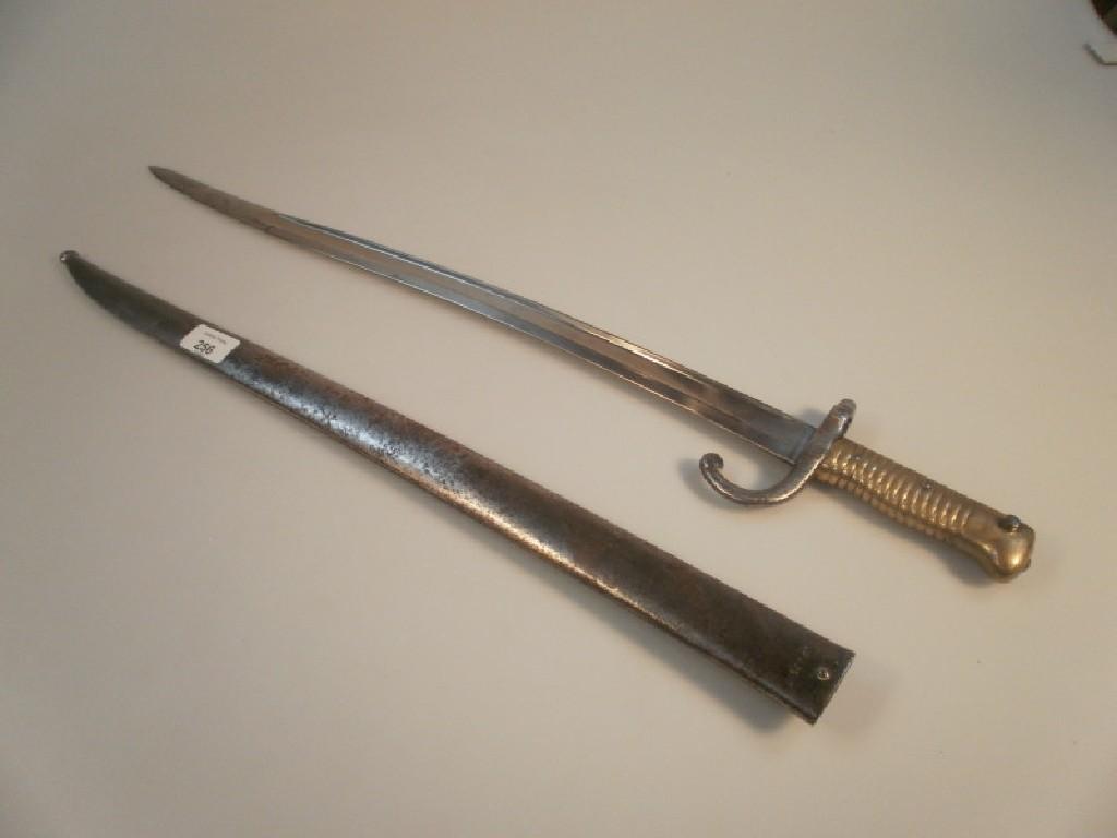 Appraisal: A thC French army stainless steel bayonet in scabbard blade