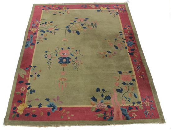 Appraisal: ROOMSIZE RUG Triple green maroon and tan border with a