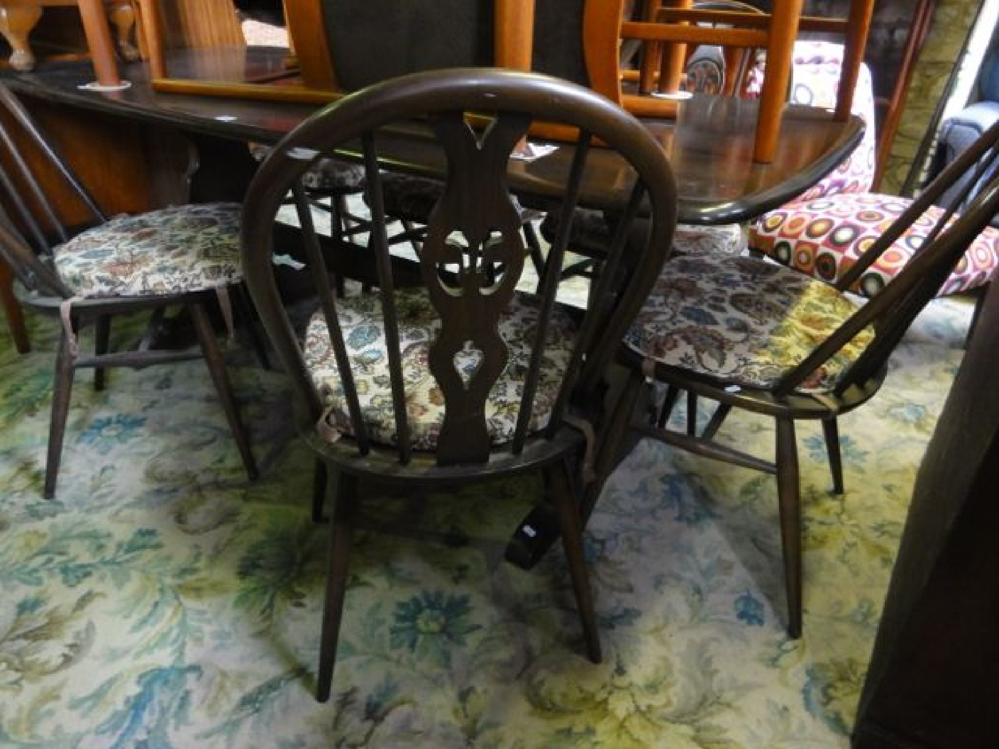 Appraisal: An Ercol dark stained elm refectory table of rectangular form