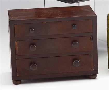 Appraisal: Miniature mahogany chest of drawers th century The rectangular top