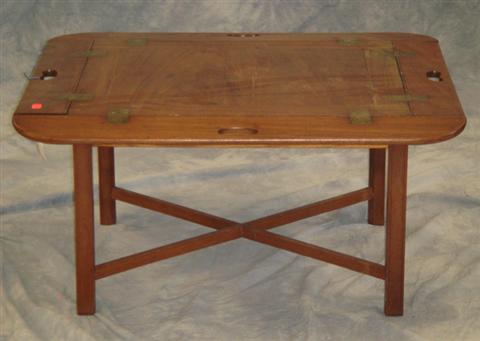 Appraisal: Georgian mahogany butler table on later coffee table base x