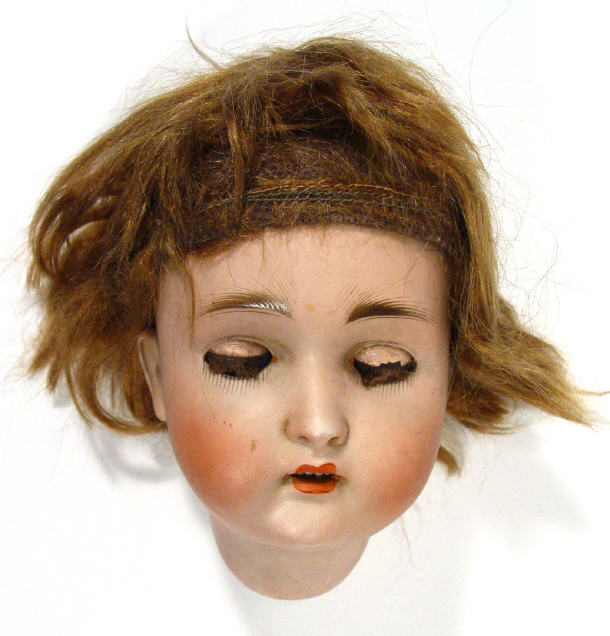 Appraisal: Hand painted German bisque dolls head with open close eyes