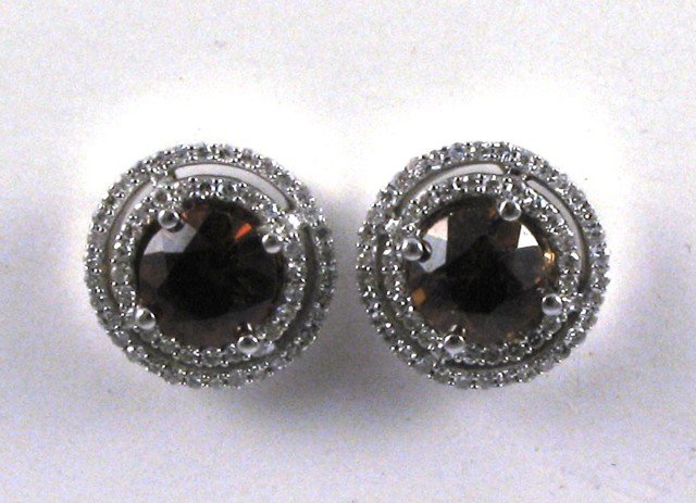 Appraisal: PAIR OF ORANGE SAPPHIRE EARRINGS each k white gold and