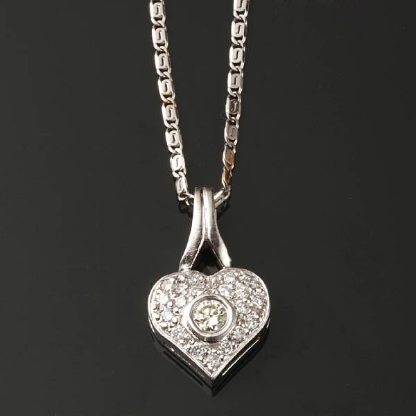 Appraisal: A diamond and k white gold heart pendant with k