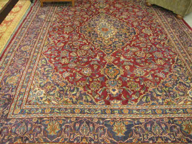 Appraisal: Isfahan Persian Handmade Rug elaborate floral on red field stunning