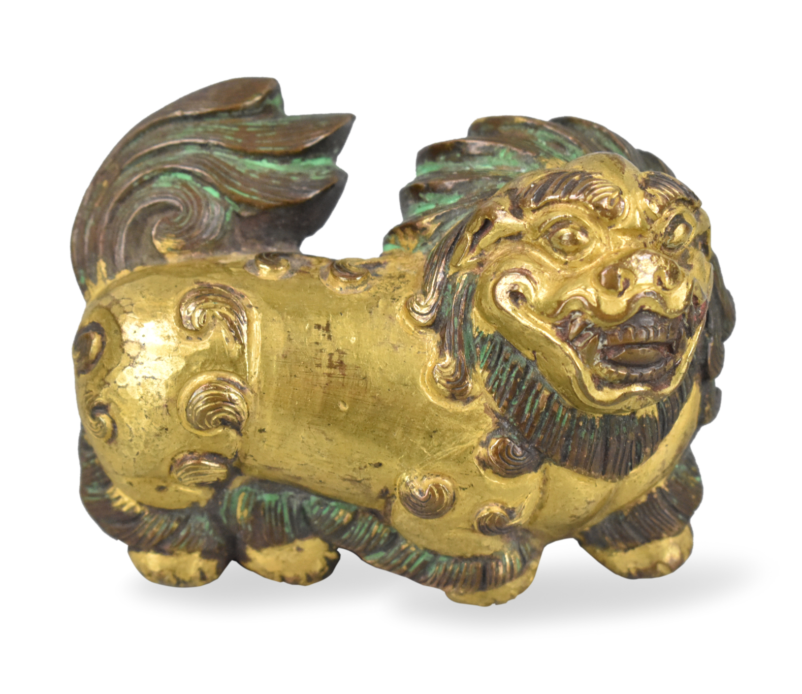 Appraisal: A Chinese gilt bronze lion figure dating from the Ming