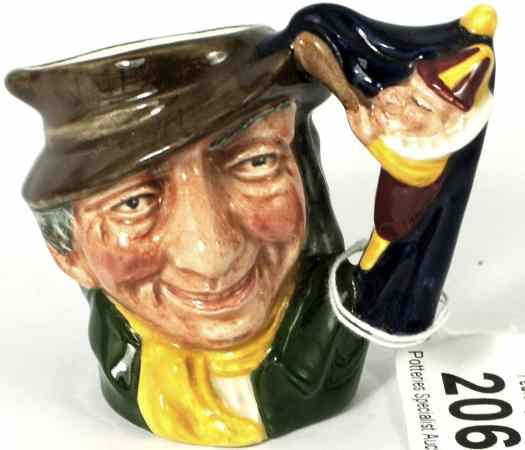 Appraisal: Royal Doulton Miniature Character Jug Punch and Judy Man D