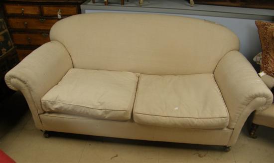 Appraisal: Victorian mahogany framed sofa upholstered in cream fabric PROVENANCE Thetis