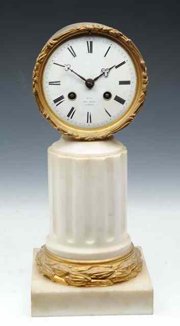 Appraisal: A TH CENTURY DRUMHEAD MANTEL CLOCK with white enamel Roman