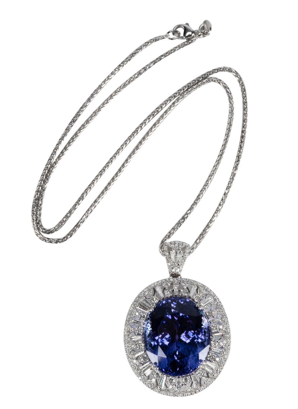 Appraisal: PLATINUM TANZANITE DIAMOND NECKLACEcentering one oval tanzanite weighing carats with