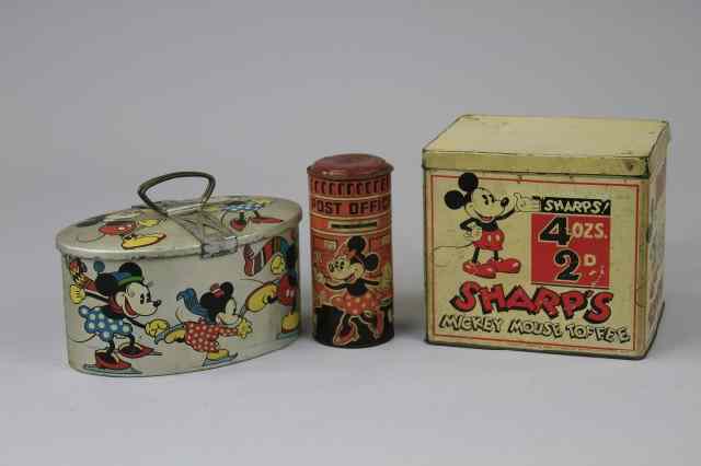 Appraisal: THREE MICKEY MOUSE TINS Includes a white Sharp's Toffee Tin